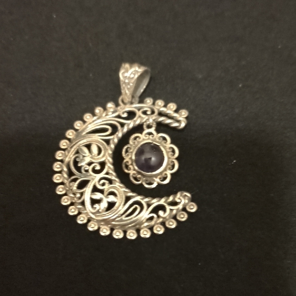 Elegant Silver Crescent Pendant with Purple Gem